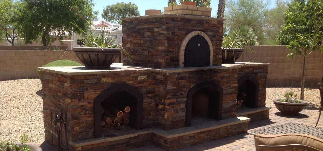 Outdoor Stone Fireplace with Pizza Oven